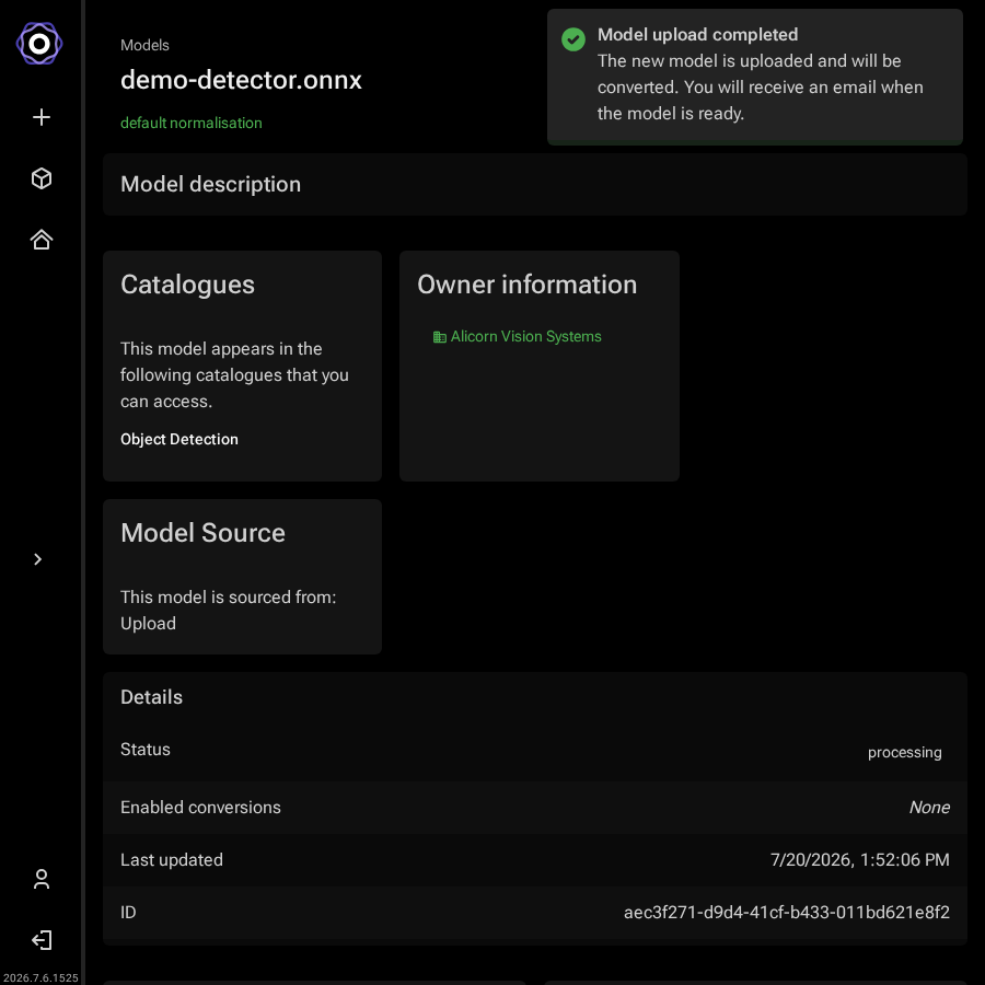 Model detail page showing a Model upload completed notification and the model status,
       catalogues, and owner information